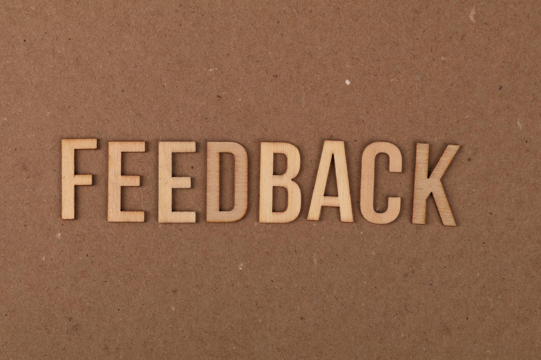 feedback wooden sign